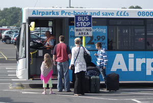 Family getting on the Airparks bus